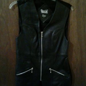 Shell genuine leather vest.  NWOT length 25"
